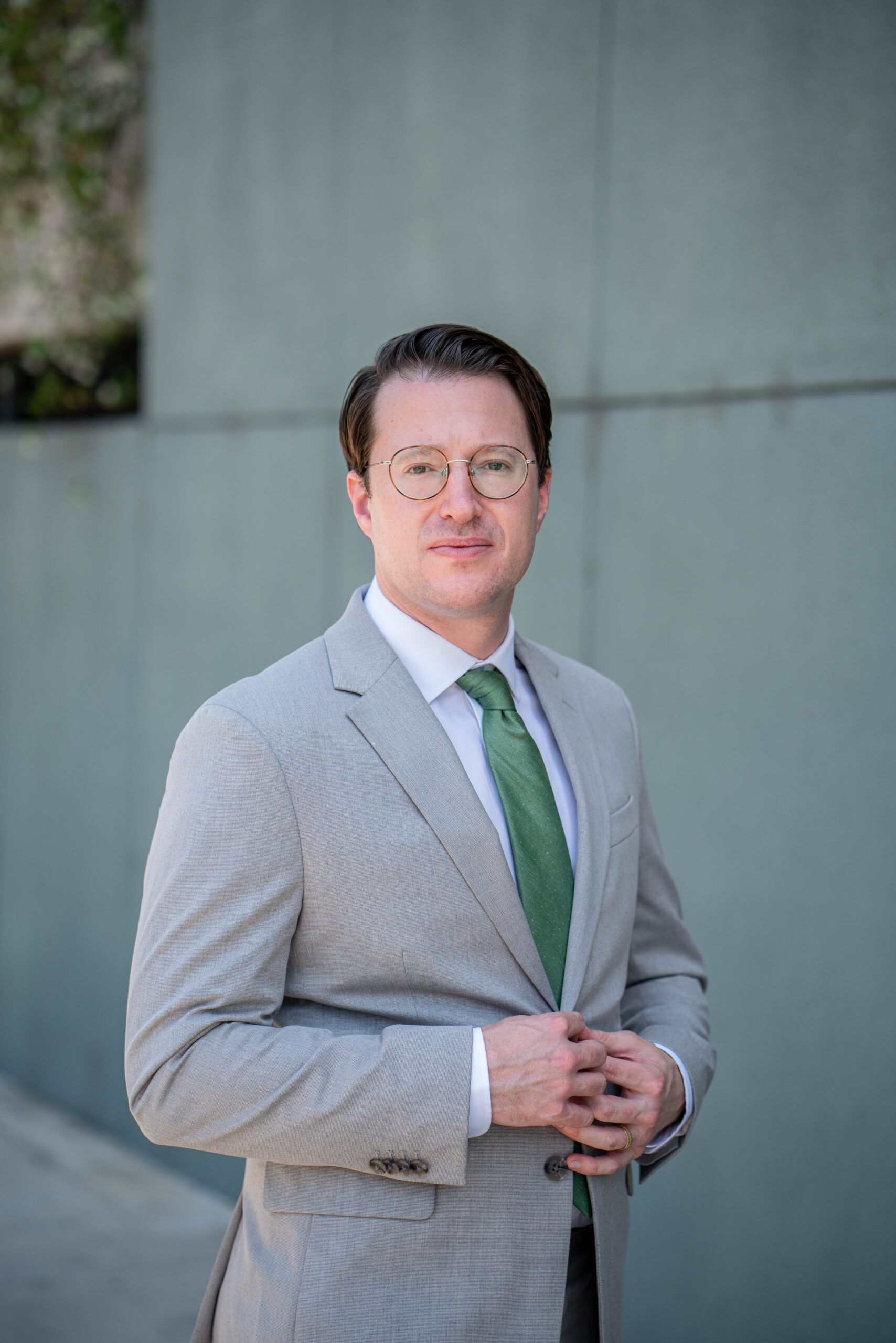 Dr. Daniel Orlovich, MD, PharmD, QME professional portrait outside Los Angeles and Sacramento clinic